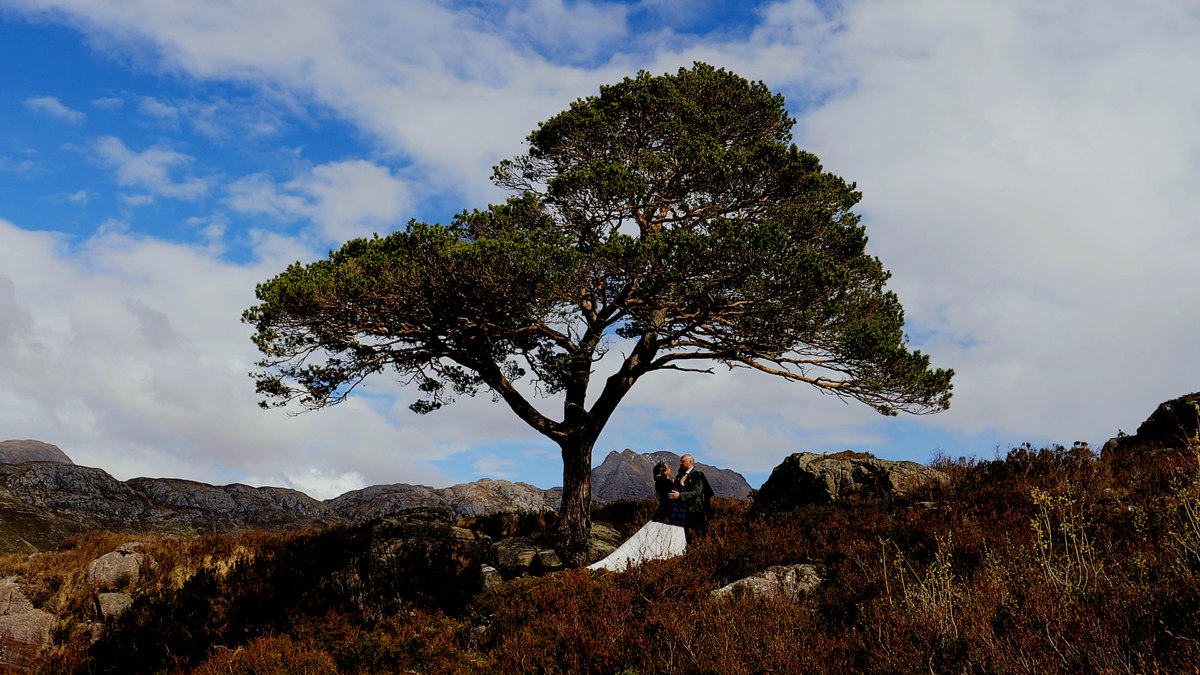 Wedding film of Emily and Dylan at Shieldaig Lodge, featuring the Highland landscape of Loch Maree and the rugged beauty of the Gairloch area.