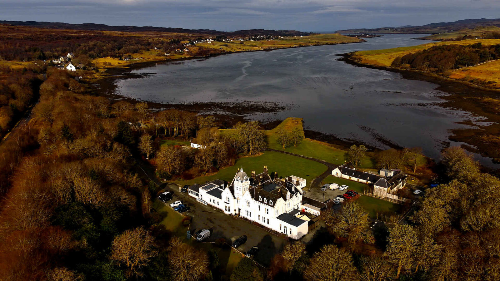 Cinematic aerial drone cinematography of a wedding at Skeabost House Hotel on the edge of Loch Snizort, Isle of Skye, by Thistle Production.